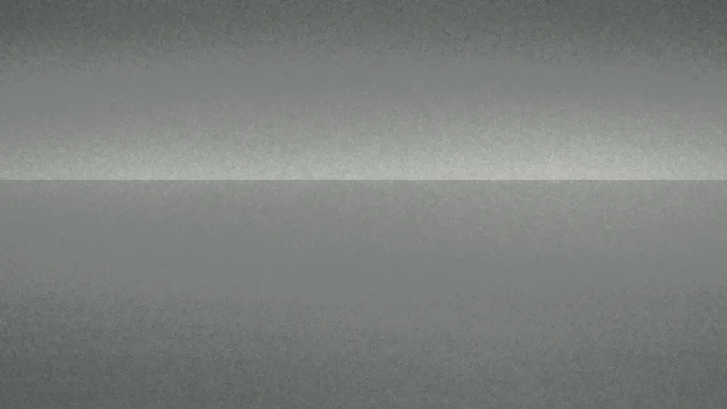 A flat expanse of pale water under a low, featureless sky, with no shoreline visible.