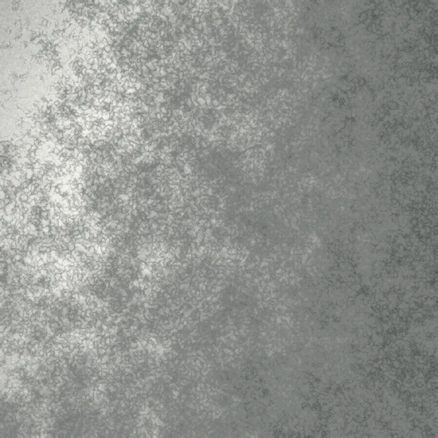 A rendered wall in raking light, showing fine aggregate and small hollows.