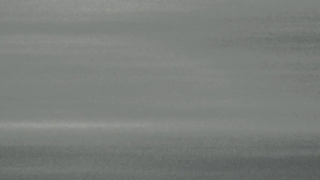 Still water in flat light, its surface broken into long horizontal bands.